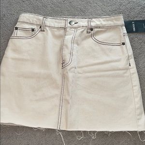 cream and black outline Jean skirt